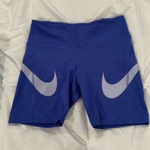 Nike Fast DRI-FIT Women’s Double Barreled Swoosh Mid Rise Compression Shorts